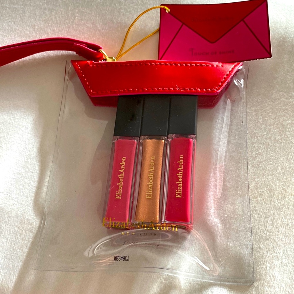 New Elizabeth Arden touch of shine set of three lip glosses